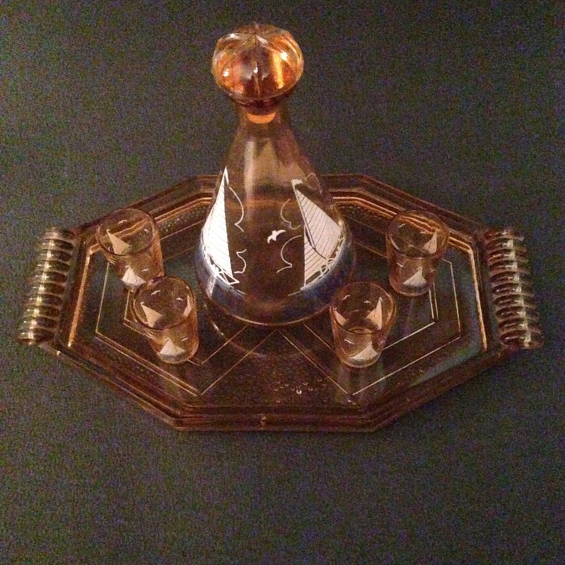 French vintage liqueur set complete in pink Tray with a boat Four Glass art glass deco 50s