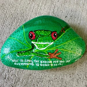 Frog hand painted  on a large stone! It has an inspiring message