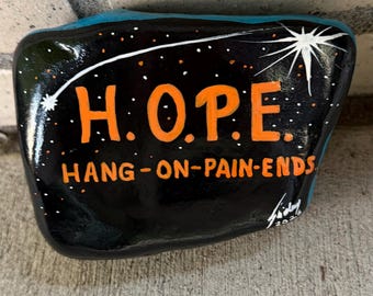 HOPE rock full of inspiration painted on a rock approximately 5“ x 4“ x 1 1/2”
