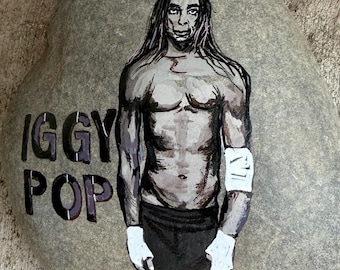 Iggy Pop painted on a rock approximately 6“ x 6“ x 2“ back has paintings too