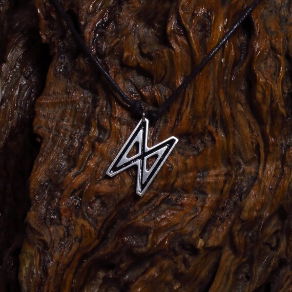 Items similar to Dagaz Rune Pendant on Etsy