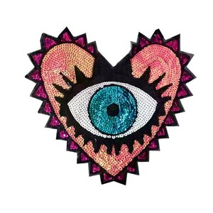 May include: A heart-shaped sequined patch with an eye design. The eye has a teal iris and white highlights, set against a black background. The heart is outlined with pink and purple sequins, creating a decorative embellishment.