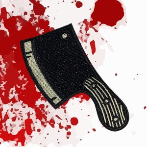 May include: A black and white embroidered patch of a butcher knife with a wooden handle, set against a red splatter background.