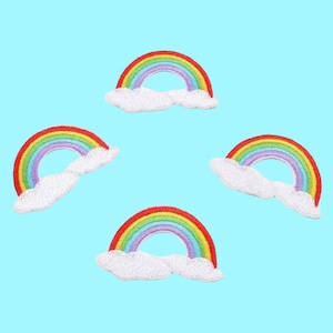 May include: Four embroidered rainbow patches with white clouds. Each patch features a rainbow with red, orange, yellow, green, blue, indigo, and violet colours.