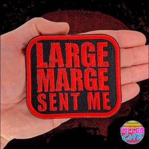 May include: Red and black embroidered patch with the text "LARGE MARGE SENT ME" in a distressed font.