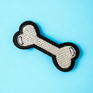 犬の骨のアイロン接着パッチ - アップリケ (3 x 6.3 cm)