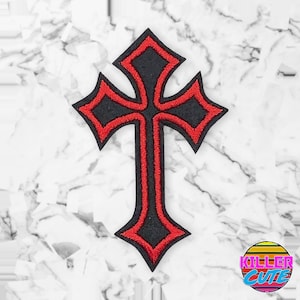 May include: A black and red embroidered cross patch. The cross has a thick red outline and a black center.