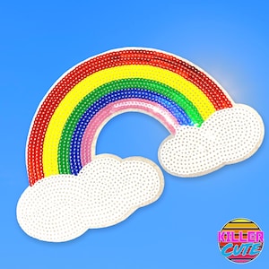 May include: A rainbow-colored sequin patch with white clouds. The rainbow has red, orange, yellow, green, blue, and pink stripes. The patch is perfect for adding a touch of whimsy to clothing, bags, or other accessories.