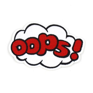 Pode incluir: Texto vermelho bordado "Oops!" em um balão de fala branco. O balão de fala tem um contorno preto.