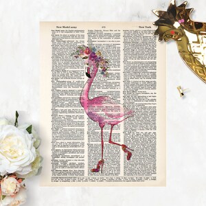 May include: A pink flamingo with a floral crown stands on a page from a vintage dictionary. The dictionary page features the definition of "New Model Army" and "New York".