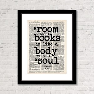 May include: A black and white typography print with the quote "A room without books is like a body without a soul" attributed to Cicero.