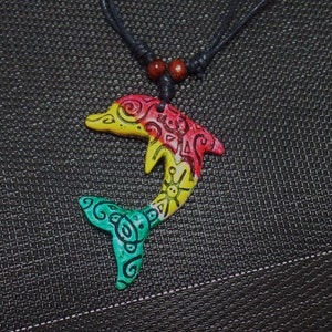 Dolphin Necklace - Rasta Dolphin Necklace - Resin Dolphin Pendant with Taino Symbols Engraved - Coqui Taino, Sun and  Spiral Symbols