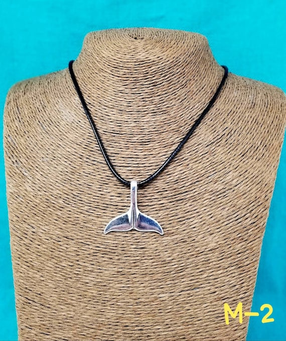 Dolphin on sale tail pendant