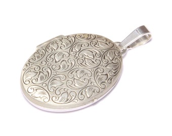 Oxidized and beautifully decorated silver medallion