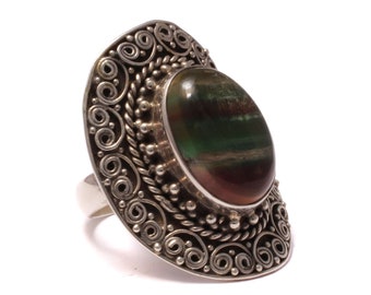 Large silver ring with gemstone