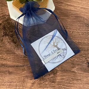 Deputy 6 point star badge tie clip in a blue organza gift bag from stamps of love