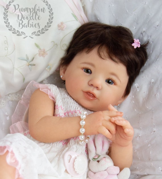 smiling reborn doll