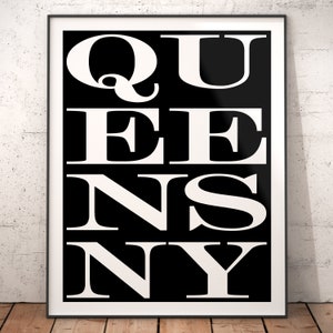 May include: Black and white typography print with the word "Queens" in bold, white letters on a black background.