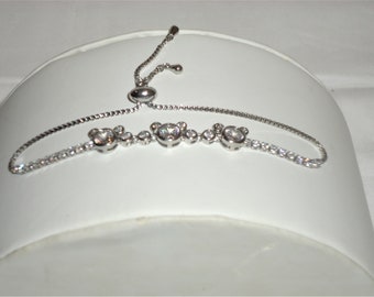 Zilveren schakelarmband met zirkonia-drievoudige hart