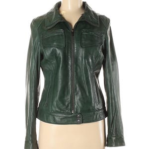 May include: A dark green leather jacket with a zipper closure and multiple pockets.