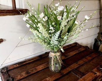 artificial silk flowers in vase