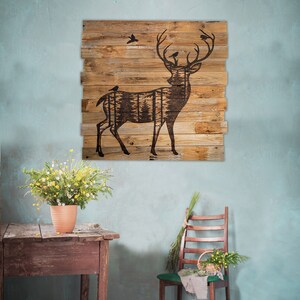 Large square deer wall hanging on country farmhouse blue kitchen wall