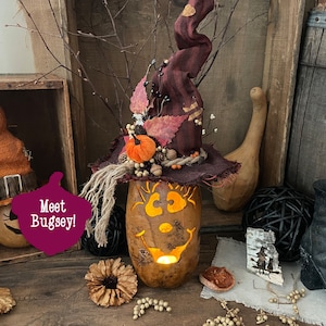 秋のひょうたん、不気味なカボチャの飾り、手作りのハロウィーンの飾り、キャンドル付きカボチャ