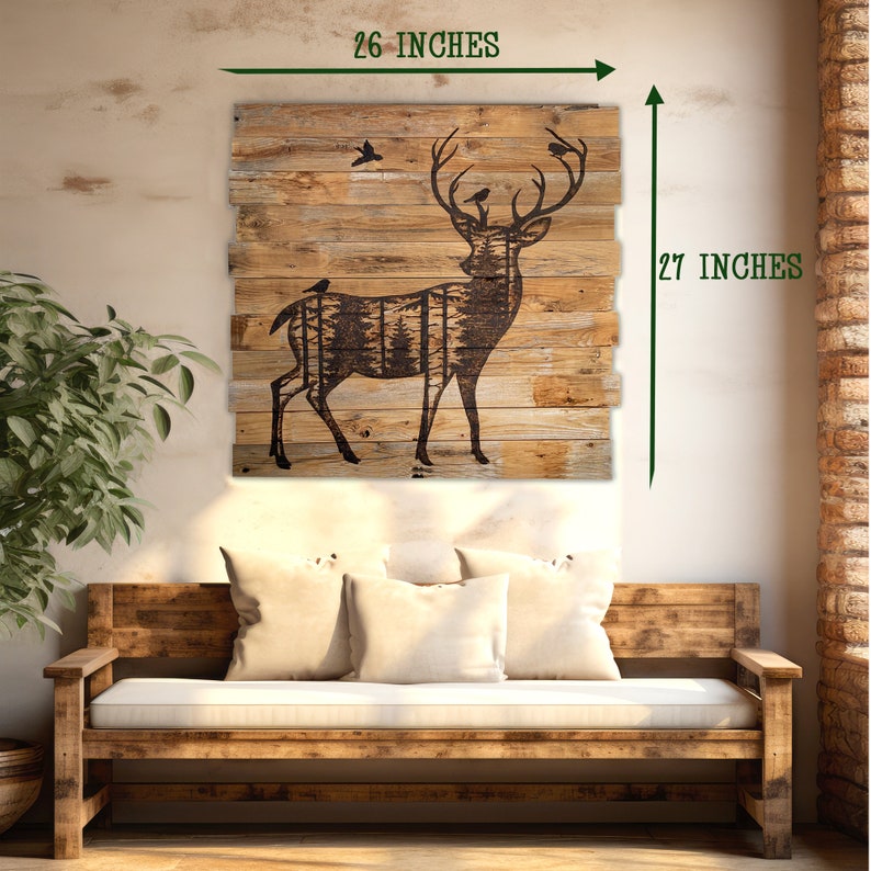 A square wood wall hanging featureing a deer and forest silhoette. This piece hangs in an entryway hall and measures 26 x 27 inches.