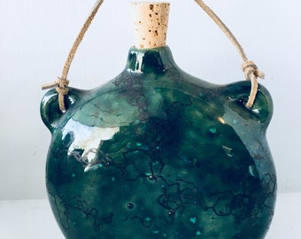 One Ornamental water jug, southwestern, horsehair fired ,ceramic clay, smooth surface