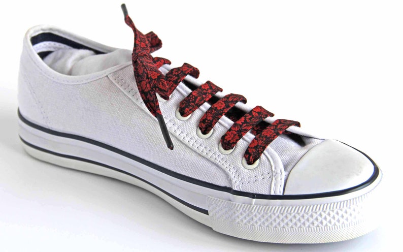 black shoes with red roses