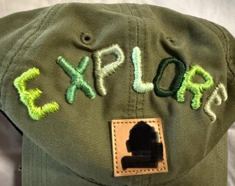 Schirmmütze aus Canvas - Basilikum mit EXPLORE in Grüntönen