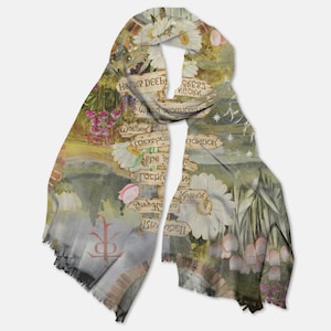 May include: A gray and green scarf with a floral pattern and a signpost with the words "Notwir Deeble" and "Waedek" in a whimsical font. The scarf has a fringe border.