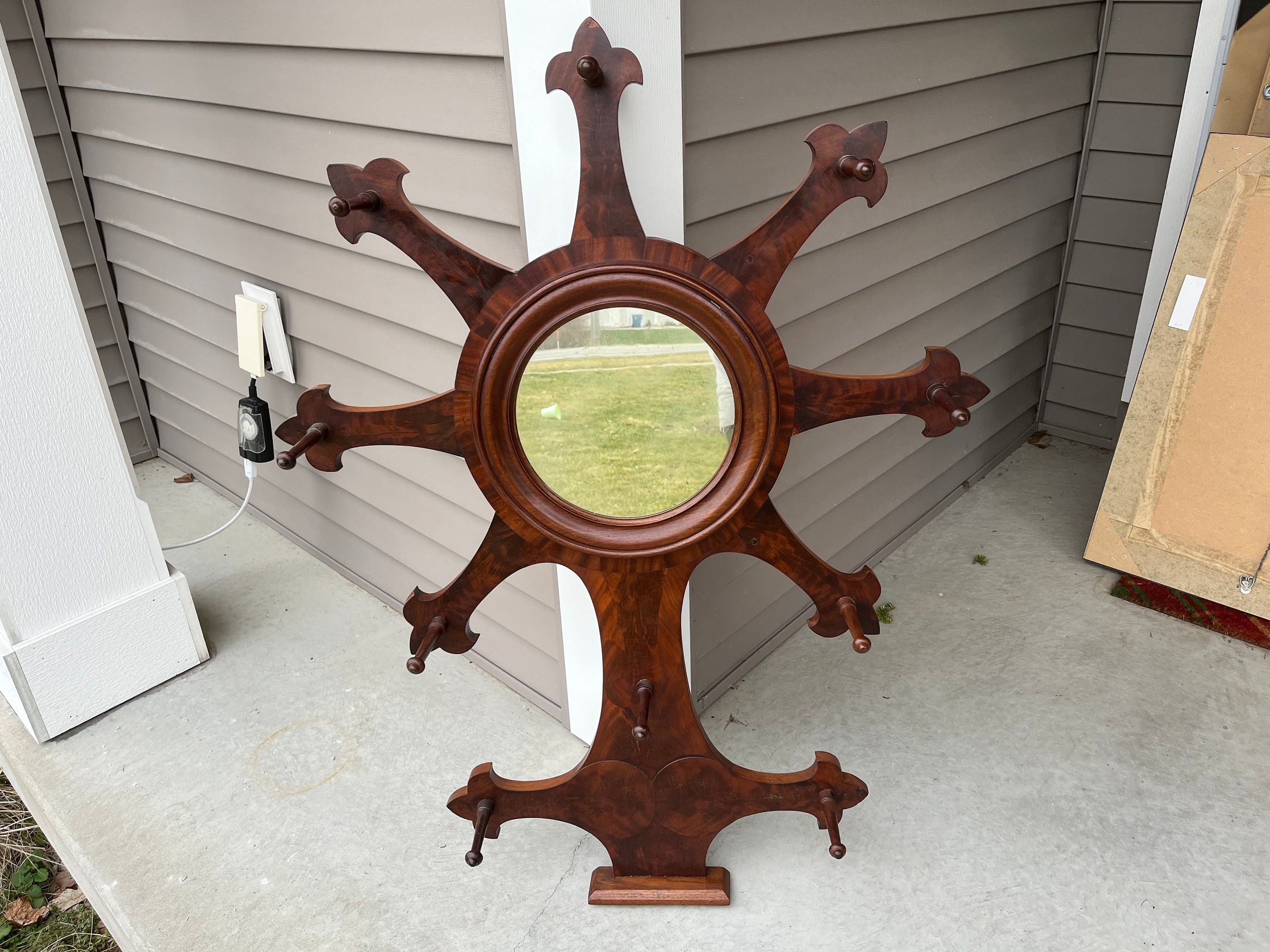 Carved Oak Sunburst with Center Face Wall Mounted Coat Rack Carved Oak Sunburst with Center Face Wall Mounted Coat Rack