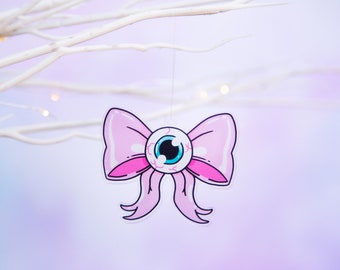 Cute Creepy Christmas Charm - Eyeball with pink bow ornament