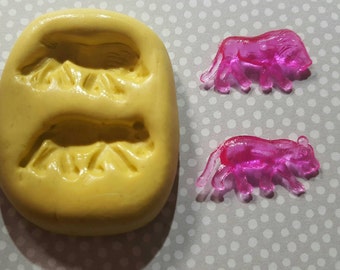 Miniature Lions Flexible Silicone Mold for polymer clay,  resin,  wax,  etc. It is food safe.