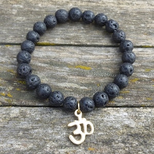 Bracelet yoga en pierre de lave noire 8mm et son pendentif OM - AUM - OHM