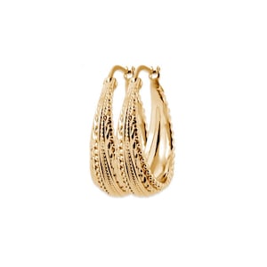 May include: A pair of gold hoop earrings with a textured design. The earrings are made of 14k gold and have a polished finish.