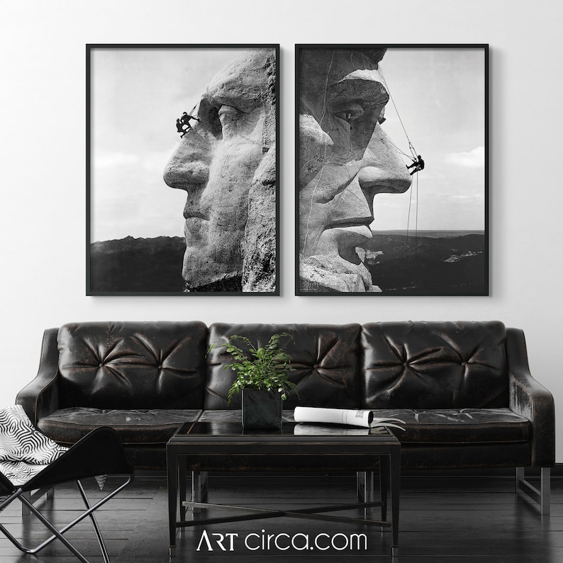 May include: A black and white photograph of two men working on Mount Rushmore. The men are hanging from ropes and appear to be cleaning the face of George Washington. The photo is split into two frames.