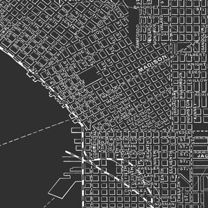 May include: A black and white map of a city with street names and grid layout. The map shows the streets of Seattle, Washington, USA. The map includes street names like Madison Street, Jackson Street, and Pike Street.