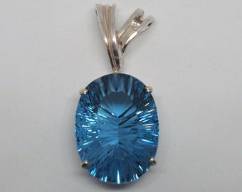 49.91ct Oval Blue Topaz Pendant