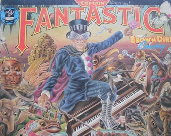 Elton John - Captain Fantastic and The Brown Dirt Cowboy- vinyl record with lyrics booklet and scraps booklet