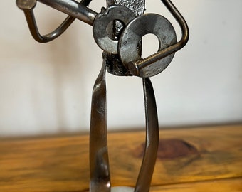 Railroad Spike Guitarist