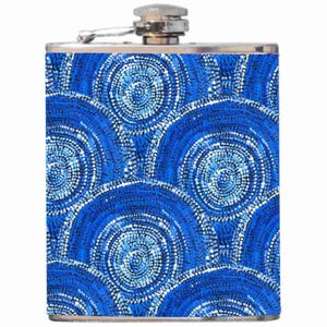 May include: A stainless steel hip flask with a striking blue and white circular design. The pattern consists of concentric circles in shades of blue, giving a textured, artistic look. It has a silver cap and hinge.