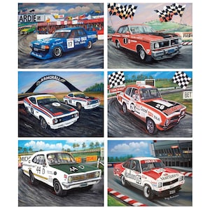 May include: A collection of six paintings depicting classic race cars on a track. The images feature various vehicles including a blue Tru-Blu Ford, a red car with number 1, a white Ford with number 1, a red Torana, a white car with number 44, and a red Marlboro car.
