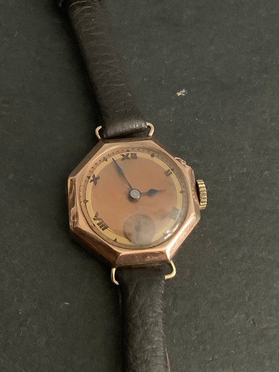 Ladies rose 9ct   gold watch on leather strap