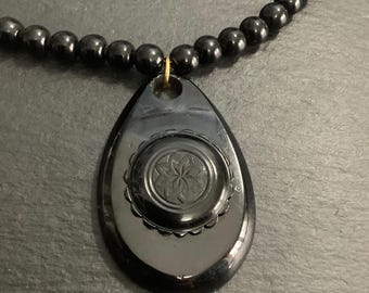 Whitby jet pendant on beads