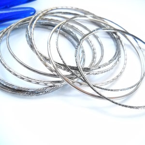 Vintage Bangles Set Bangle Bracelets Set of 14 Silver Bracelets Vintage Bangles Mid Century Silver tone Patterned Bangle Bracelets Statement