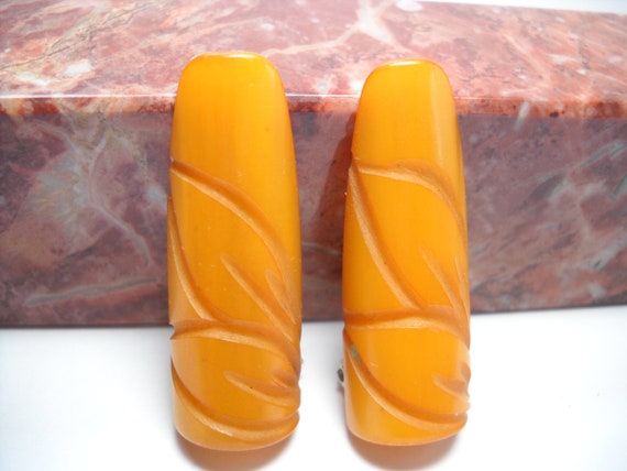 Bakelite Dress Clips Matching Bakelite Carved But… - image 1