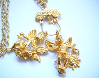 Vintage Kirk's Folly Cherub Charms Charm Necklace Sun Moon Stars Gold tone  Rhinestones Designer Signed Angels statement Good Luck Gift Boho