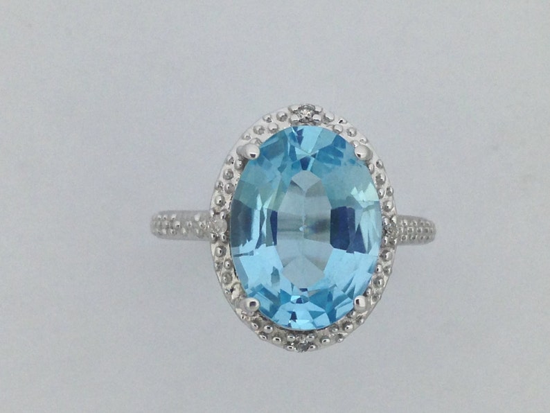 Natural Blue Topaz with Natural Diamond Ring in 925 Sterling Silver